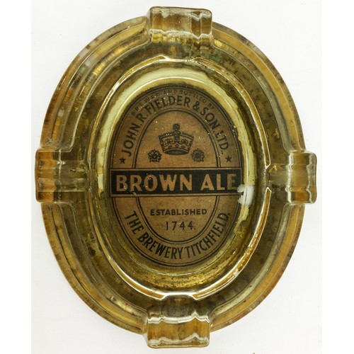 48 - TITFIELD BREWERY ASHTRAY. 5.9ins long oval glass ashtray with 4 cig indents. Label underneath for Jo... 