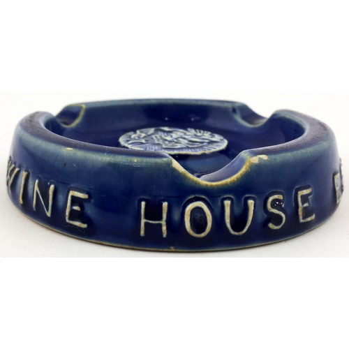 52 - HENEKEYS OLD WINE HOUSE ASHTRAY. 4.8ins diam. Dark blue stoneware glaze with pict. t.m. Various Doul... 