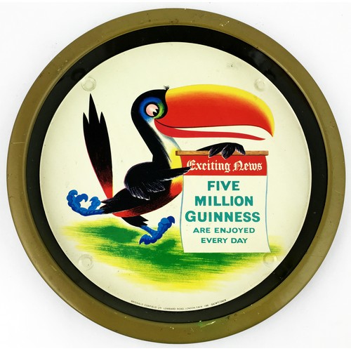 53 - GUINNESS FIVE MILLION EVERY DAY TIN TRAY. Jovial jogging Toucan dashing ahead holding out a copy of ... 