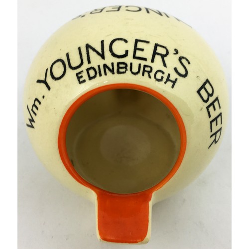 55 - Wm YOUNGERS BEER EDINBURGH ASHTRAY. 2.6ins tall. Unique (?) spherical shape with 2 protruding tongue... 