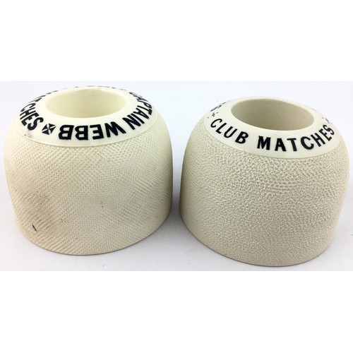 66 - MATCHSTRIKERS DUO. 2.9ins tall. PUCK and CLUB matches. Heavy curved topped shapes, matches fit to ce... 