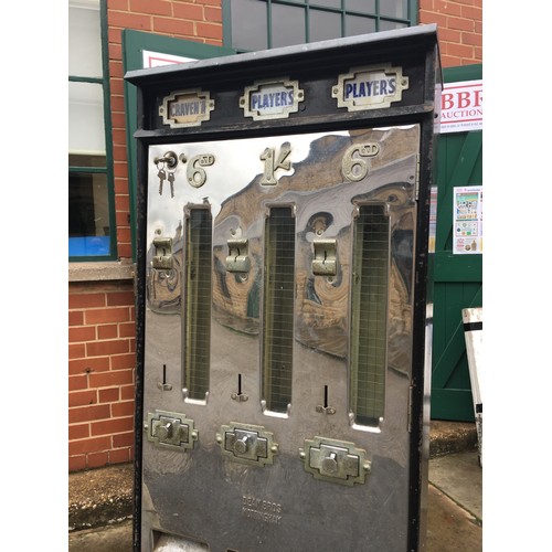 68 - PLAYERS & CRAVEN A CIGARETTE VENDING MACHINE. 65 x 20 ins, 10ins deep to edges of roller feet. Cast ... 