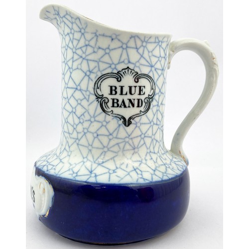 69 - WATSONS BLUE BAND WATER JUG. 6.5ins tall. Blue & white patterned with blue band to bottom with WATSO... 