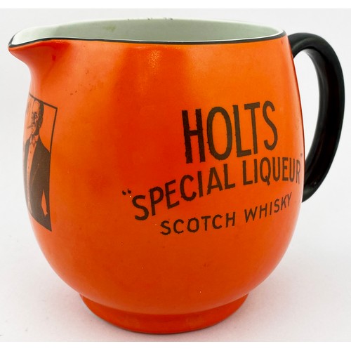 71 - HOLTS SCOTCH WHISKY WATER JUG. 5ins tall. Bright orange, black transfer to two sides HOLTS/ MOUNTAIN... 