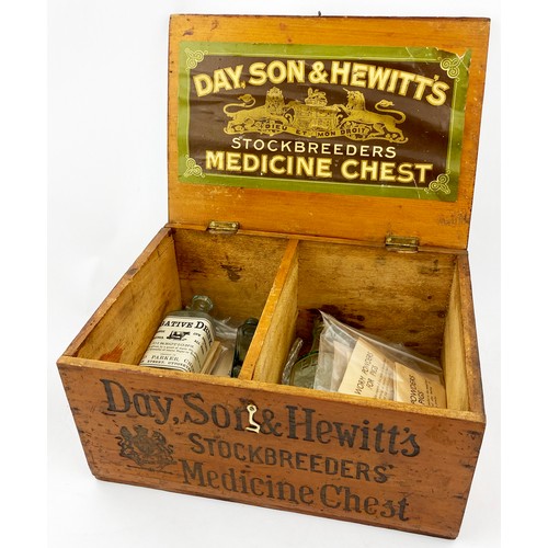 74 - DAY, SON & HEWITTS MEDICINE CHEST AND CONTENT. 8.25 x 6 x 12ins. Multiple bottle and sachets of worm... 