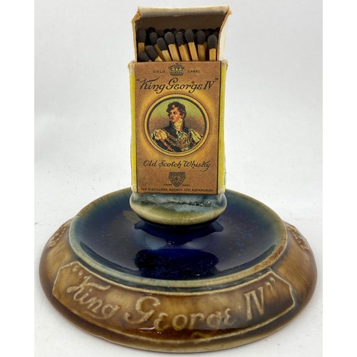 117 - ROYAL DOULTON KING GEORGE IV MATCH HOLDER/ STRIKER. 4.25ins tall. Circular base with embossed letter... 