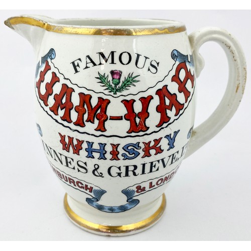 135 - UAM VAR WHISKY WATER JUG. 5ins tall. Colourful transfer one side, gold medals etc to other, gold rim... 