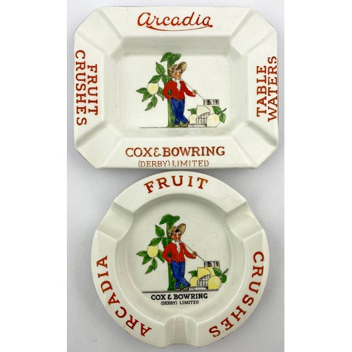 161 - COX & BOWRING ARCADIA ASHTRAY PAIR. Largest 5.5ins. Red lettering with multicoloured pict to centre ... 