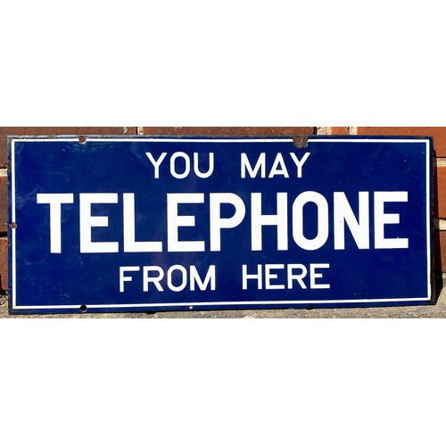 167 - YOU MAY TELEPHONE FROM HERE DOUBLE SIDED ENAMEL SIGN. 9 x 22ins. Rectangular, dark blue background, ... 