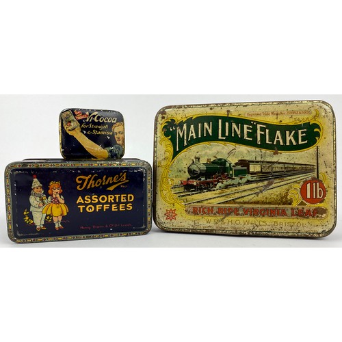 171 - WILLS MAIN LINE FLAKE TOBACCO TIN. 6.5 x 5ins. Central image of stea train. Rust & surface wear.