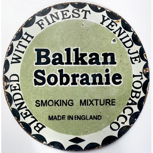 182 - BALKAN SOBRANIE ENAMEL SIGN. 14ins diam. Circular sign. Black, sage green & white. Some dullness & r... 