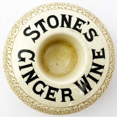 228 - STONES GINGER WINE TYRE SHAPED MATCHOLDER & STRIKER. 4ins diam. Off white black transfer STONES GING... 