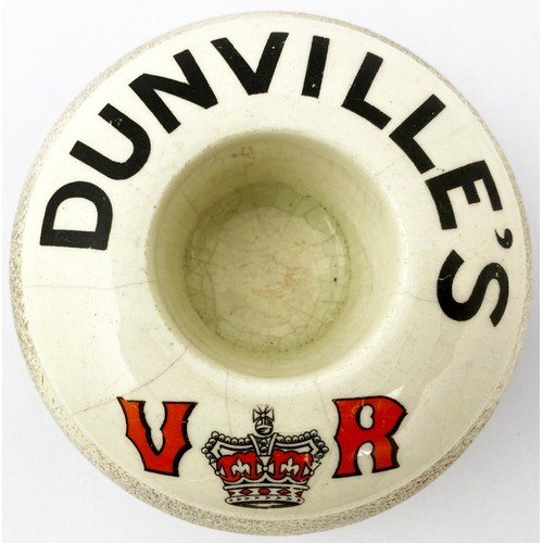 229 - DUNVILLES VR WHISKY TYRE SHAPED MATCHOLDER & STRIKER. 4.5ins diam. Off white, Black and red transfer... 