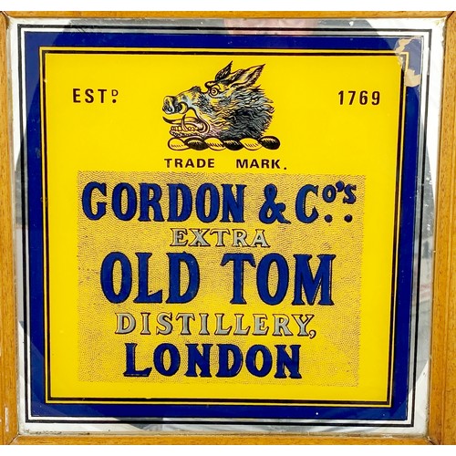 300 - GORDON & CO OLD TOM FRAMED MIRROR. 14ins diam. Blue & yellow colours with boar t. m. to centre. Some... 