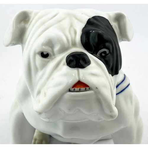 307 - BULLDOG GUINNESS FIGURE. 7ins tall. All white characterful seated bulldog some black patches, blue l... 