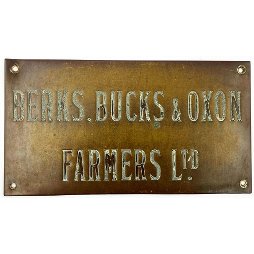 332 - FARMERS BRASS SIGN. 12 x 6.5ins. Impressed lettering BERKS, BUCKS & OXON/ FARMERS LTD. Surface wear ... 