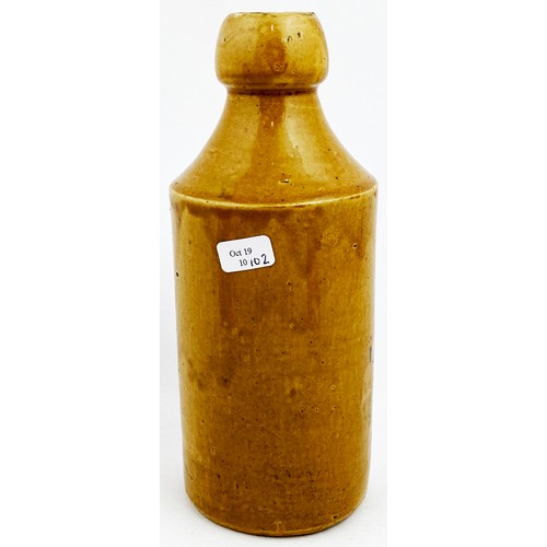 21 - BRISTOL PRICE POWELL & CO SAMPLE GINGER BEER BOTTLE. 6.7ins tall., std, all tan, cork top. Minor lip... 