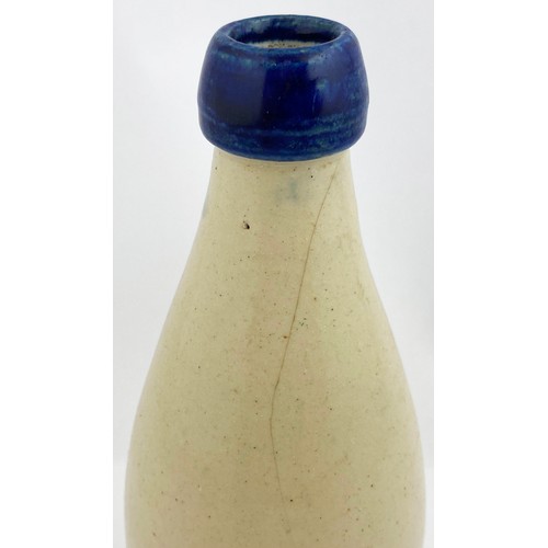 61 - GREENOCK BLUE LIPPED GINGER BEER BOTTLE. 7.8ins tall. Ch., deep blue blob lip. Blue infilled letteri... 