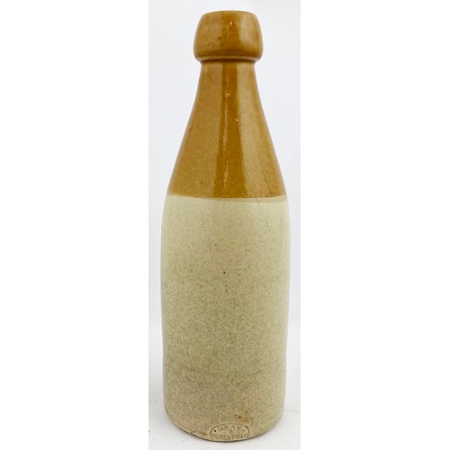 68 - DUNS GINGER BEER. 8.3ins tall. Ch., t.t., blob cork top. Around one inch rear base flake near p.m, n... 