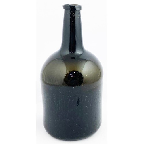 57 - FAT BODIED CYLINDER WINE BOTTLE. 10.5ins tall. Very dark olive green glass, applied collar lip, fron... 