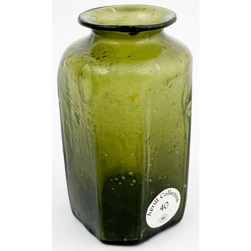 90 - OCTAGONAL FREEBLOWN UTILITY BOTTLE. 3.7ins tall. A vert attractive, wonderfully crudely formed mid g... 