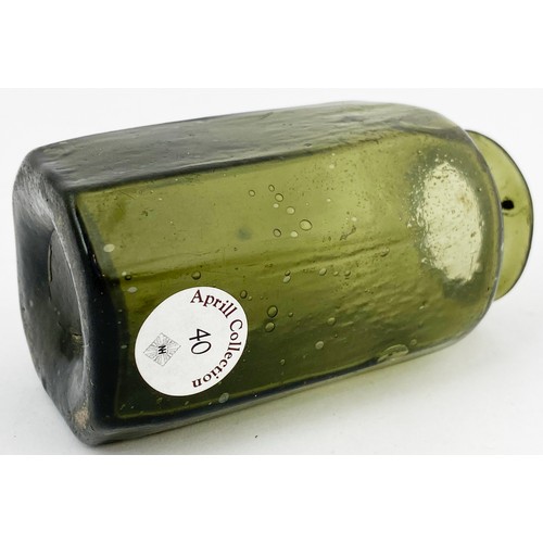 90 - OCTAGONAL FREEBLOWN UTILITY BOTTLE. 3.7ins tall. A vert attractive, wonderfully crudely formed mid g... 