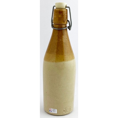 7 - CHARLES MACKIE KEITH GINGER BEER BOTTLE.  9.2ins tall, ch., t.t., swing stopper (very minute glaze f... 