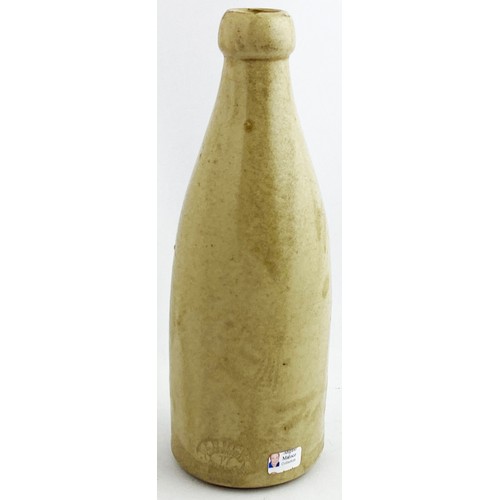 11 - THE HORSESHOE GINGER BEER BOTTLE.  8.2ins tall, all white ch., blob/ cork lip. Simple blue transfer ... 