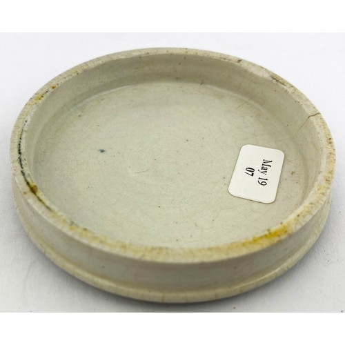 23 - LONDON POT LID. 2.8ins diam. CROWN PERFUMERY COLD CREAM LONDON. Floral border with crown trade mark ... 