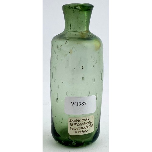 35 - FREE BLOWN APOTHECARY PHIAL. 3ins tall. Light to deep aqua glass. Classic small cylinder form with s... 