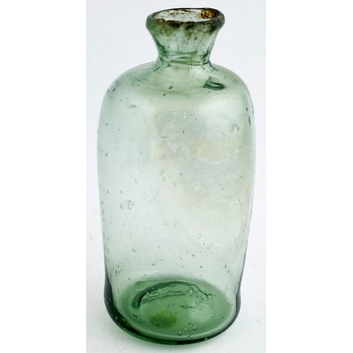 38 - FREE BLOWN APOTHECARY PHIAL. 3.8ins tall. Aqua glass with some bluey tinge, misshapen/ crude, air bi... 