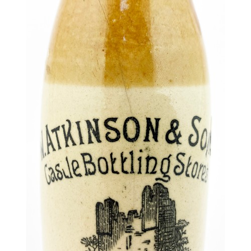 50 - HELMSLEY GINGER BEER BOTTLE. 8.1ins tall.Non bordered black transfer with WATKINSON & SONS/ Castle B... 