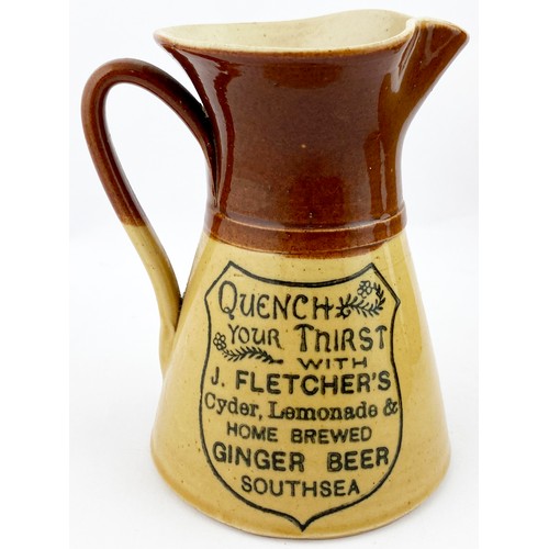 62 - SOUTHSEA WATER JUG. 5.3ins tall. T,t., waisted form, side handle. Dark drown top, lower tan. Shield ... 