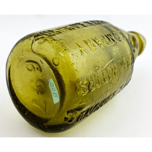 67 - BURY ST EDMUNDS AMBER DUMPY CODD BOTTLE. 7.4ins tall. Golden amber glass dumpy codd. Embossed vertic... 