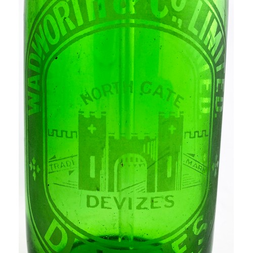 103 - WADWORTH & CO DEVIZES SODA SYPHON. 11.5ins tall to impressed trigger top. Bright green glass, flared... 