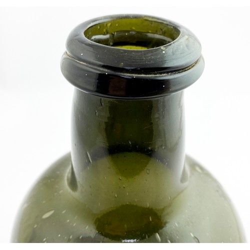 112 - ENGLISH BILTON PARK WIDE MOUTHED WINE BOTTLE. 8.7ins tall, black glass (dark green held to light) wi... 