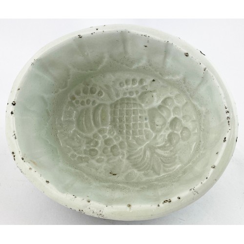 117 - GAMAGES BLANCMANGE MOUL. 4.1ins tall. White stoneware mould with pineapple impressed design. Outside... 