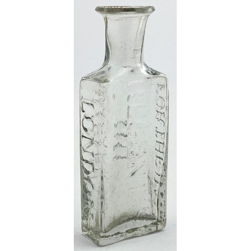 217 - ROWLANDS MACASSAR OIL BOTTLE. 3.6ins tall. Bright clear flint glass, flattened rectangular body, sho... 