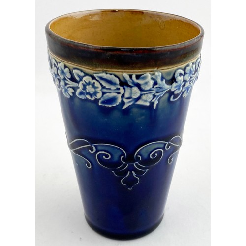 336 - DOULTON VICTORIA BEAKER. 5ins tall. Blue & green glaze, white floral design to top rim. Embossed VIC... 