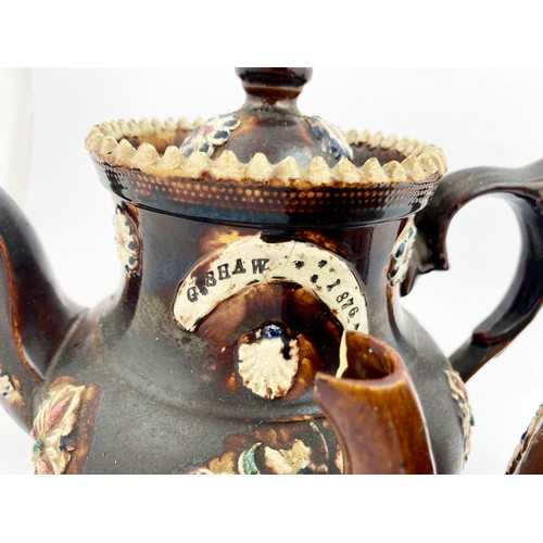 569 - TEAPOT DUO. Tallest 9ins. Browm salt glaze, floral patterns, impressed MRS AUSTIN/ SOMERVILLE ASTON/... 