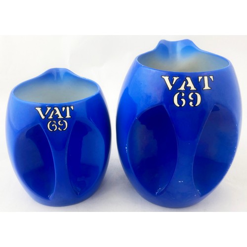 26 - VAT 69 JUG DUO. Tallest 5.25ins. Bright blue & white. Base p.m. Minor surface wear but lovley pair. ... 