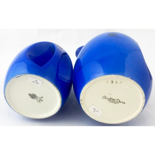 26 - VAT 69 JUG DUO. Tallest 5.25ins. Bright blue & white. Base p.m. Minor surface wear but lovley pair. ... 