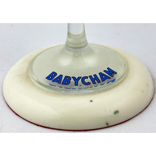 86 - BABYCHAM BOTTLE & GLASS ADVERTISING PIECE. 14.5ins tall. Hovering bottle pouring in to a named Babyc... 