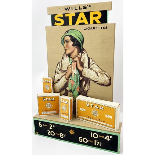 338 - WILLS STAR CIGARETTES STAND UP SHOWCARD. 16.5 x 11ins. 3D cardboard shop display featuring 4 actual ... 