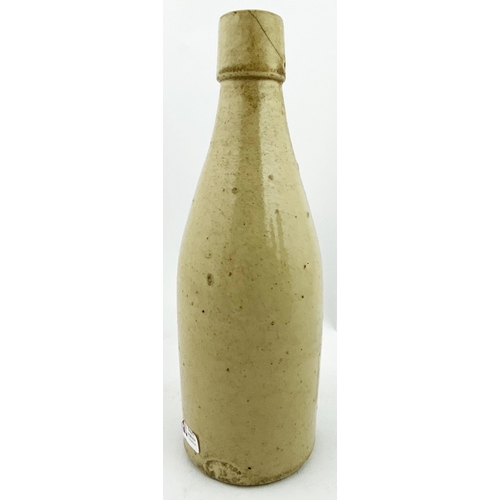 18 - HAMILTON GINGER BEER BOTTLE.  8.3ins tall, ch., all over off white swing stopper closure. Heavily im... 