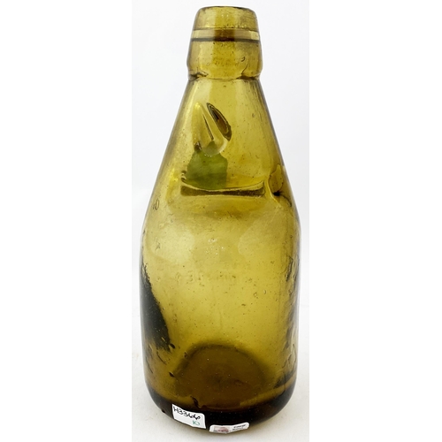 29 - DUMPY CODD BOTTLE. 7.4ins tall, amber glass, original rubber washer. Rear heavily embossed CODDS PAT... 