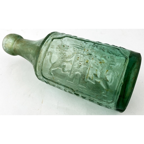 37 - NORTHAMPTON EARLY GLASS GINGER BEER BOTTLE. 7.1ins tall, aqua glass. Straight sided cylinder with di... 