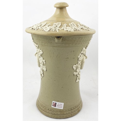 66 - LIPSCOMBE WATER FILTER. 15.2ins tall. Heavy off white stoneware waisted water filter emblazoned with... 