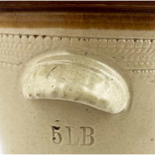 74 - MENZIES DUNFERMLINE STORES BUTTER CROCK. 7.7ins tall. Tan rim (wheeled decoration, & bottom edge), t... 