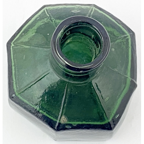 53 - OCTAGONAL INK BOTTLE. 2.2ins tall. Squat tooled lip, deep green glass, unusual delineated shoulders.... 